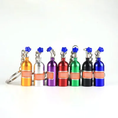 Professional Customized Creative Stainless Steel Bottle-Shaped Keychain Mini Pill Box Storage Colorful Options Fashion Trend