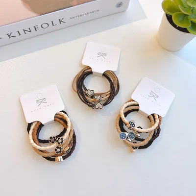 Hair Ties With Beige and Black Elastic Looks Awesome on Your Wrist and Cute in Hair