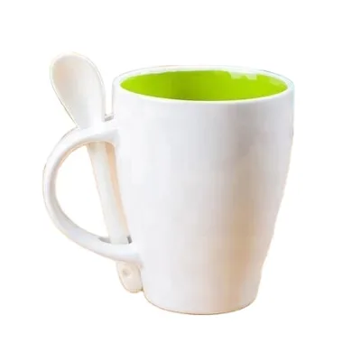 Simple design inside color glazed white coffee tea mug with spoon
