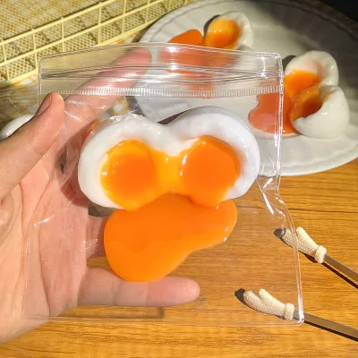 Wholesale Egg Yolk Squeeze Toy TPR Stress Relief Adult Kids Squishy Funny Vomit Custard Ball Decompression Stick Toy