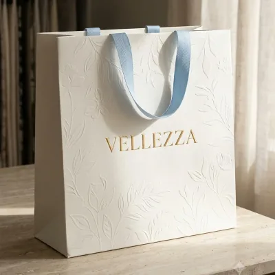 Recyclable Custom Printed logo pink and White Cardboard Bag Luxury Gift Shopping Paper Bag with Ribbon Handle for Clothing